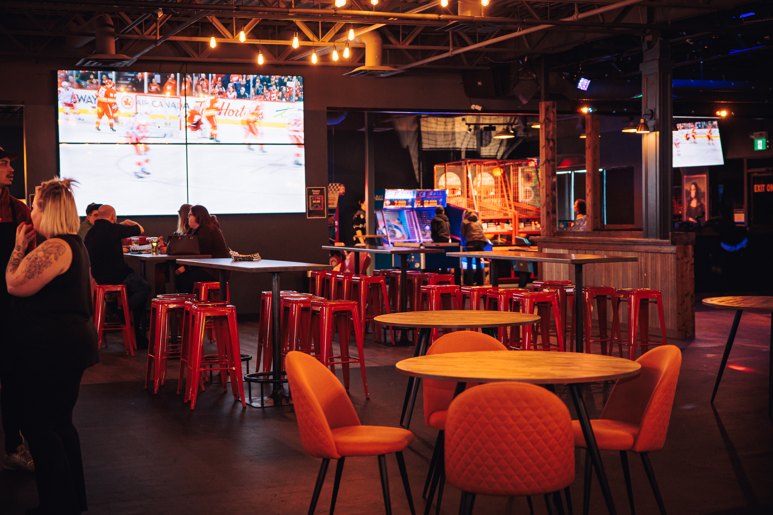 Comfortable lounge seating area with large television